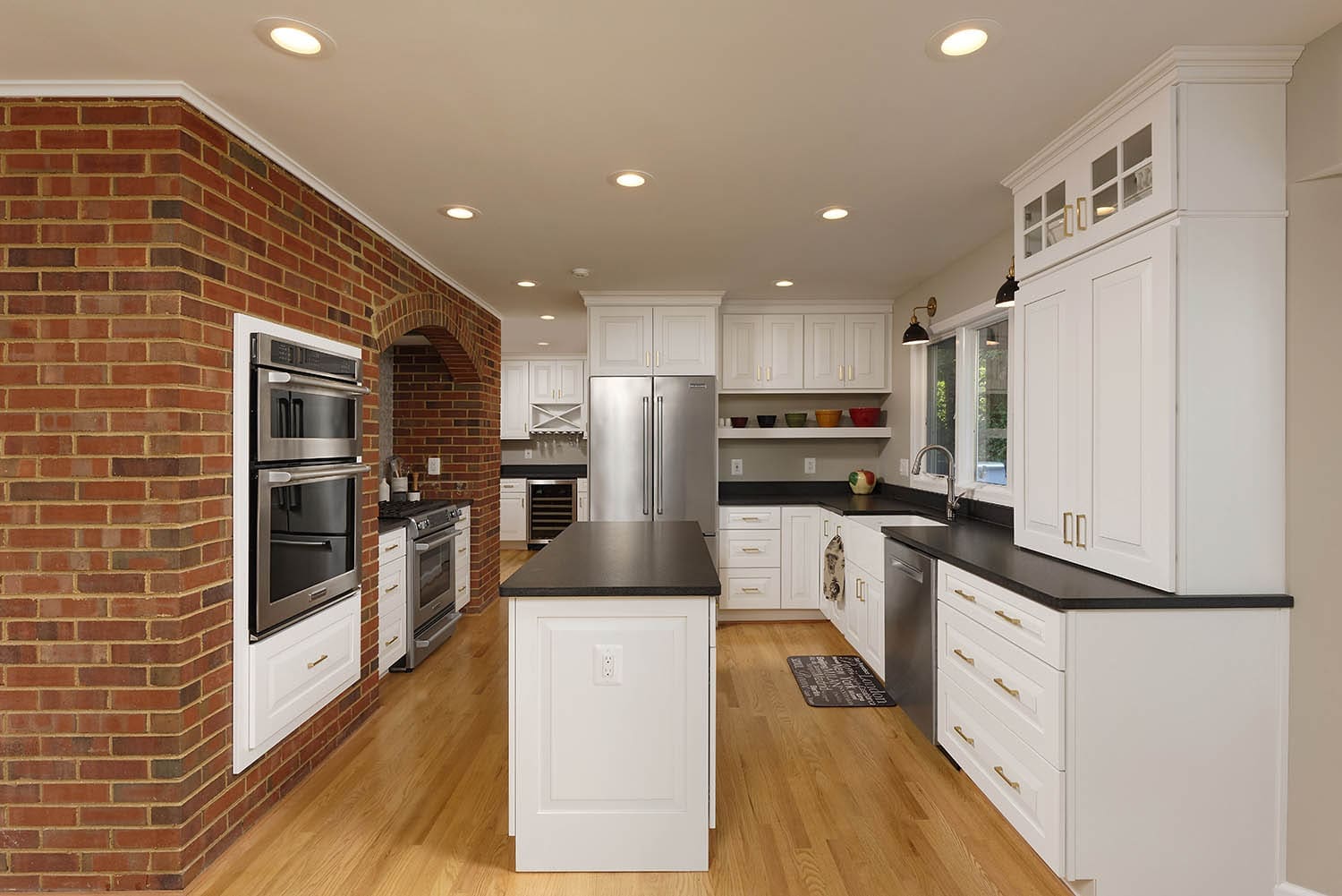 Image of kitchen where the owners chose home flooring in wood